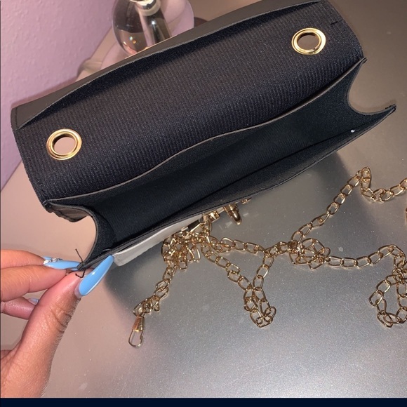 A small purse. Mostly for accessory. Black with some crème. - Picture 5 of 5